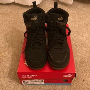 Mens black and gold high top Puma shoes!